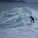 Surfing at Kahutara