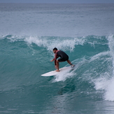 Surfing at Kahutara