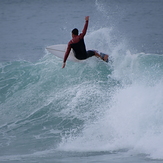 Surfing at Kahutara