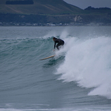 Surfing at Kahutara