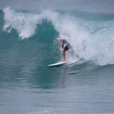 Surfing at Kahutara