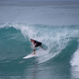 Surfing at Kahutara